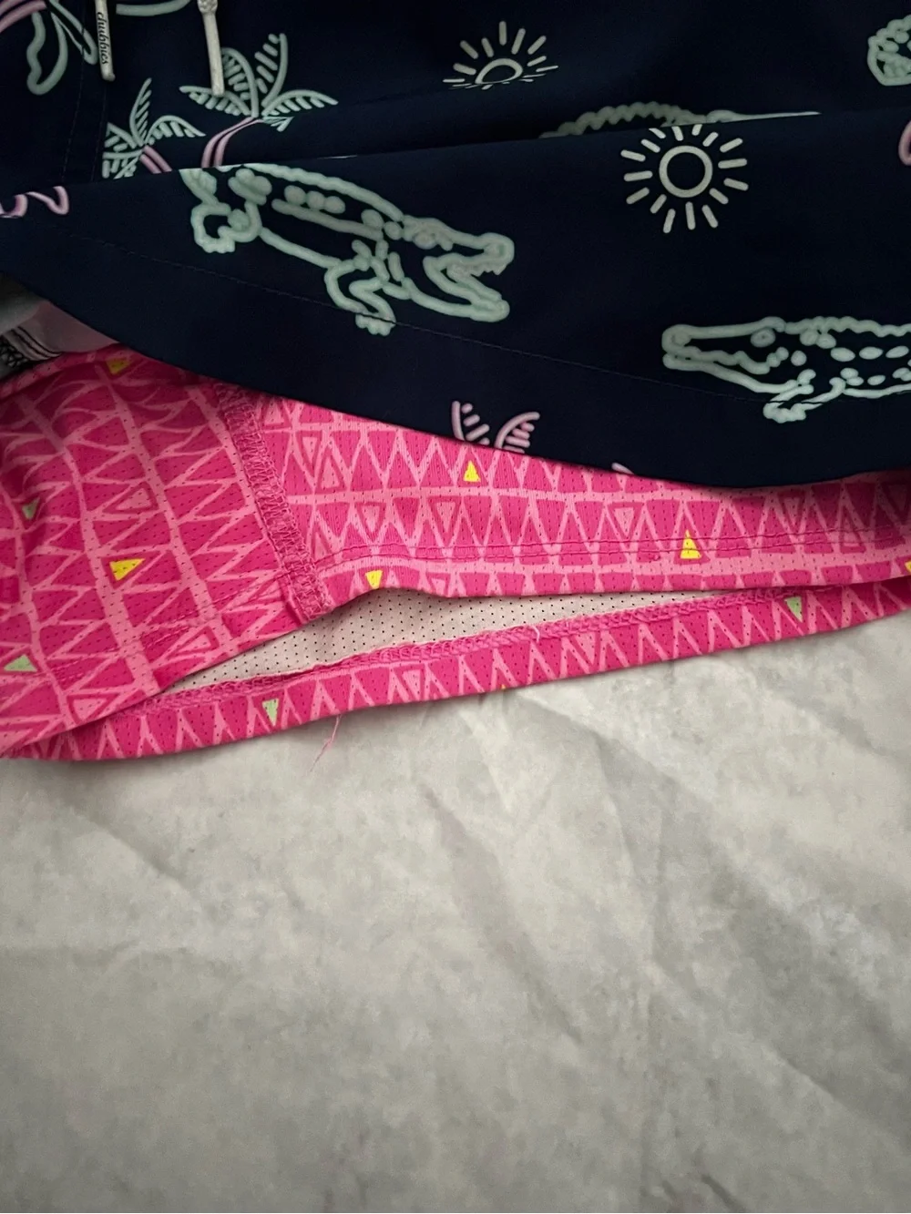 chubbies Navy Swim Trunks with Mint & Pink Alligator Print